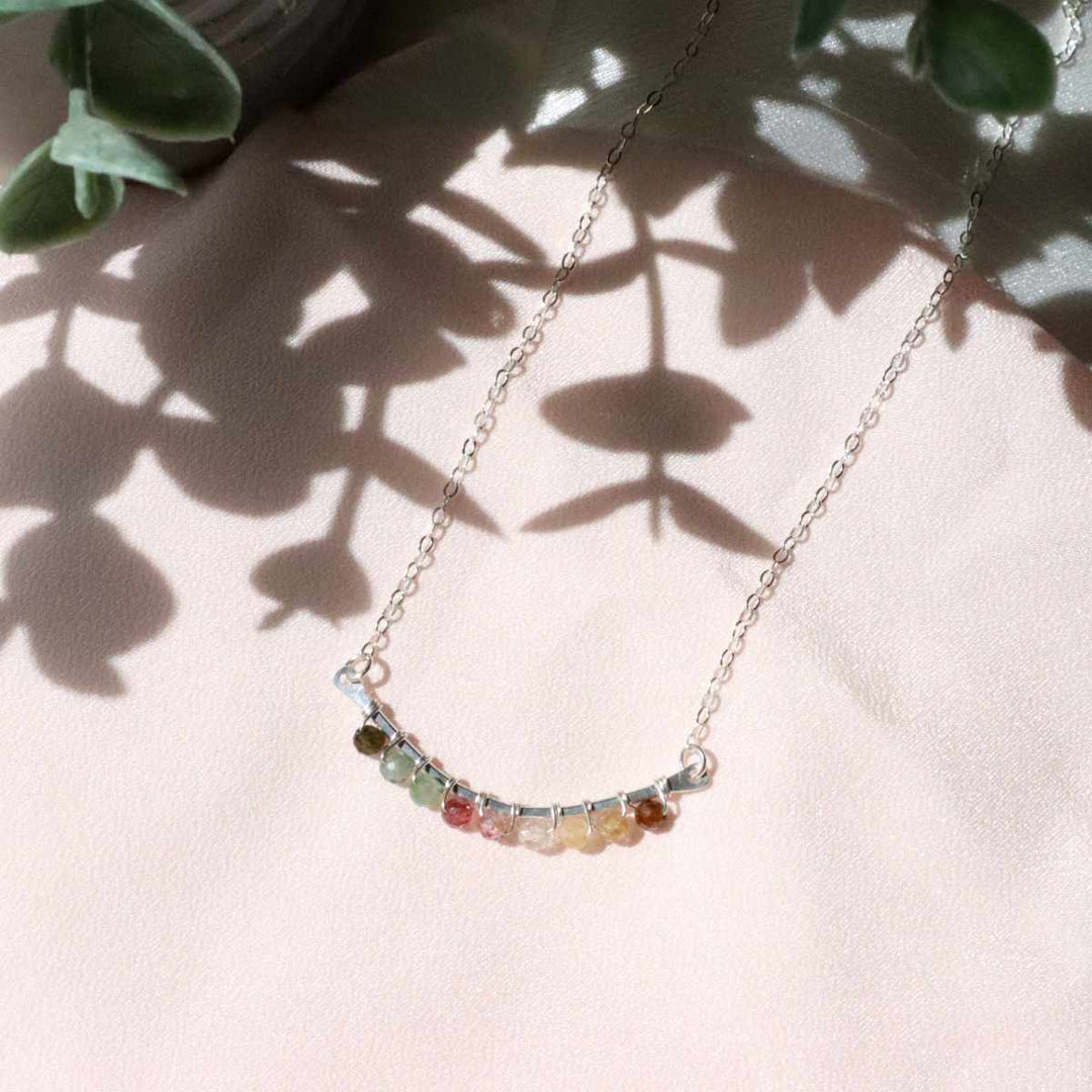 Balance necklace in sterling silver or 14k gold filled with wire wrapped tourmaline gemstones