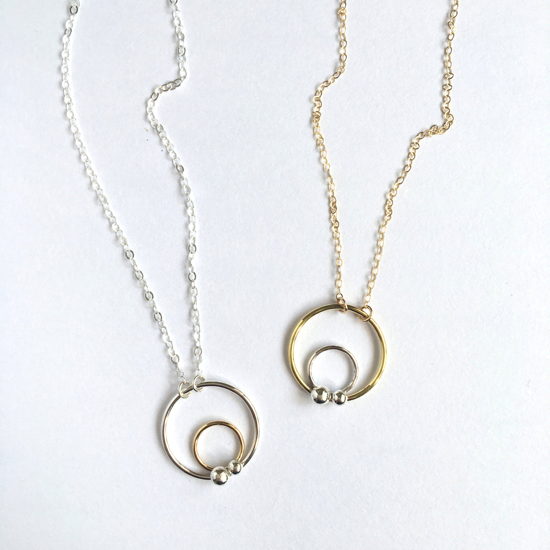 Mixed metal circle necklace in sterling silver and 14k gold filled