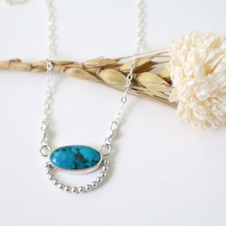 one of a kind sterling silver necklace with turquoise stone