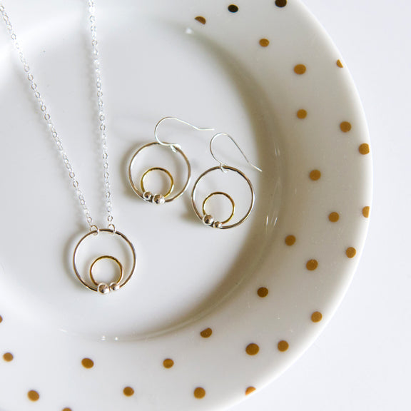 Mixed metal circle necklace in sterling silver and 14k gold filled