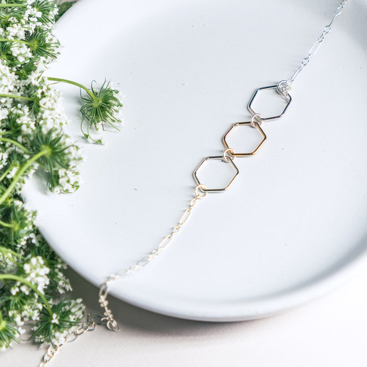 Mixed metal hexagon bracelet in sterling silver or 14k gold filled by Blossom and Shine