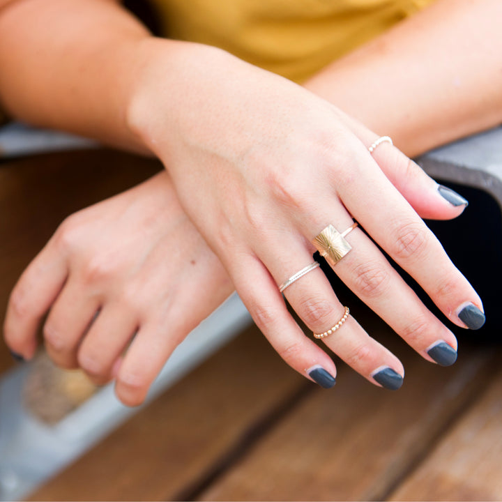 Dainty thin hammered stacking rings in sterling silver or 14k gold filled by Blossom and Shine