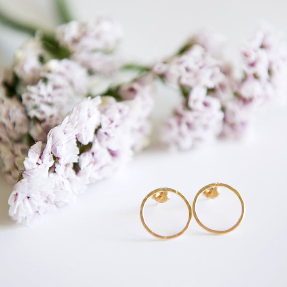 Hammered open circle stud earrings in sterling silver or 14k gold filled by Blossom and Shine