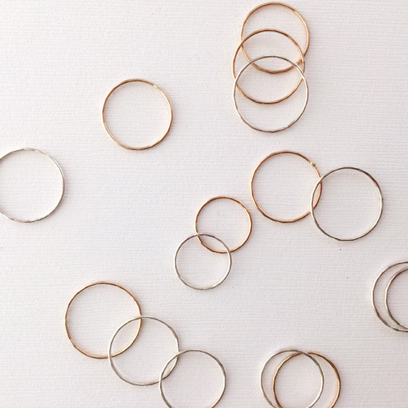 Dainty thin hammered stacking rings in sterling silver or 14k gold filled by Blossom and Shine